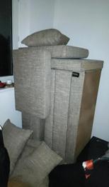 Eckcouch mit Kissen  zu verschenken